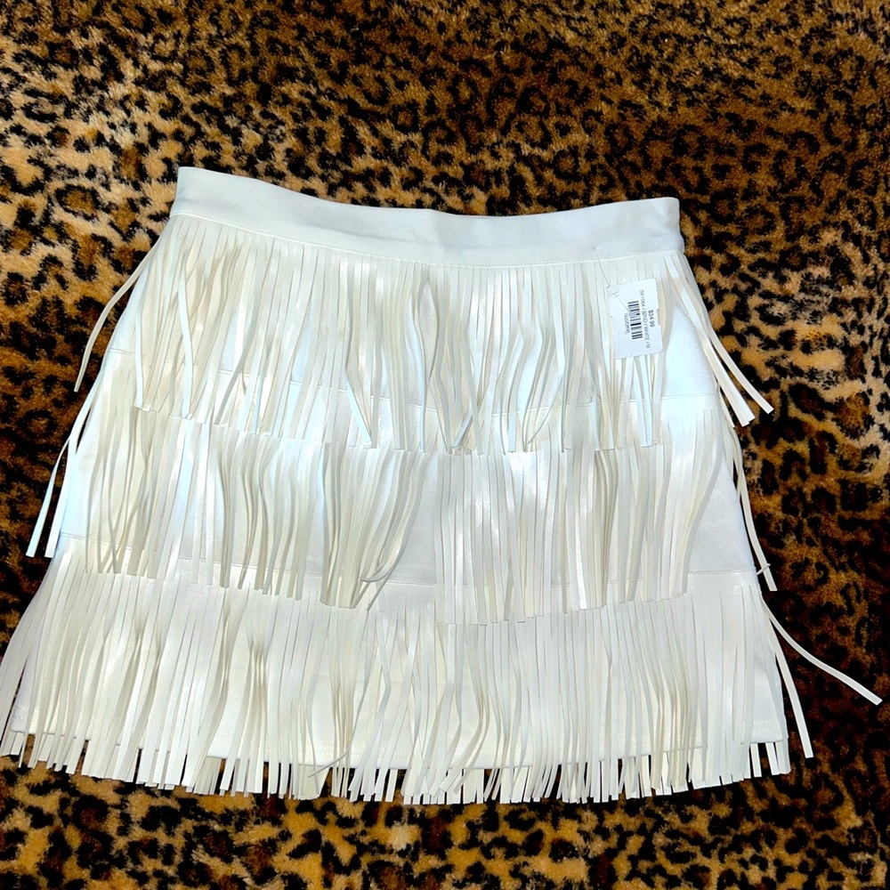 Faux leather layered fringe skirt.